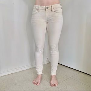 American Eagle cream raw ankle hem low rise Y2K denim jeggings beach summer